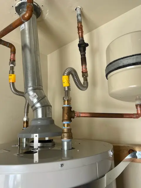 Water heater installation and plumbing repair in Four Corners